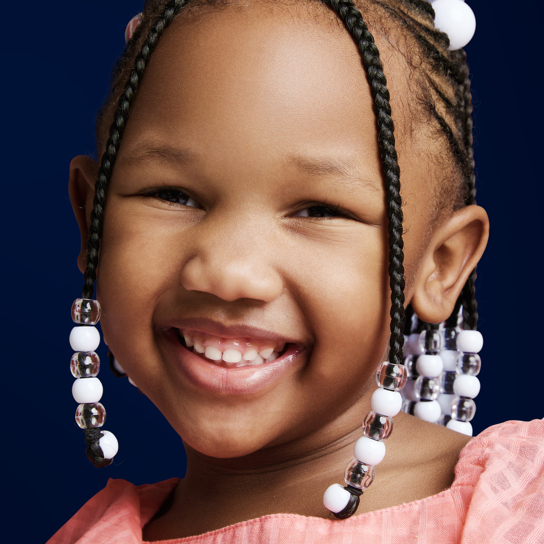 Jordan Orthodontics Rising Star early growth guidance program smiling little girl
