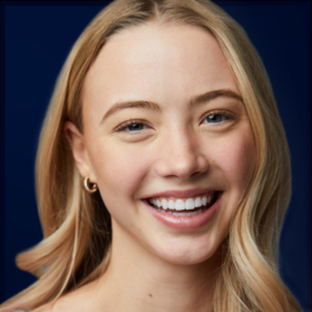 Jordan Orthodontics patient results smiling girl blonde hair