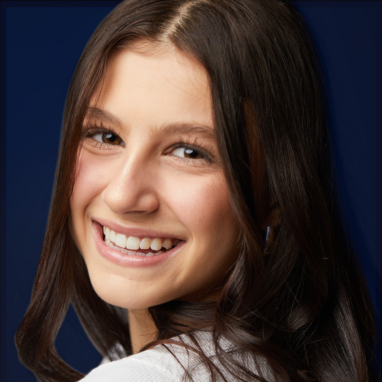 Jordan Orthodontics patient results smiling brunette girl